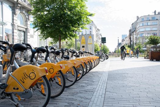 BRUSSELS,BELGIUM - June 02, 2022: public Villo bicycles parked in the sharing, High quality photo