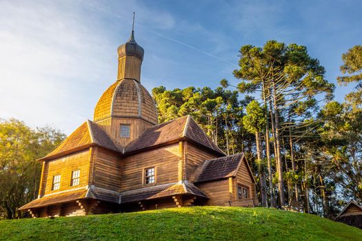 Wooden orthodox ukrainian church in Curitiba at sunrise, capital of Parana state, Brazil