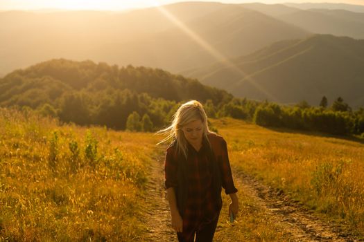 woman backpacker enjoy the view at mountain.