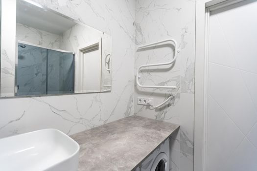 Modern bathroom with grey tiles, seamless, luxurious interior background