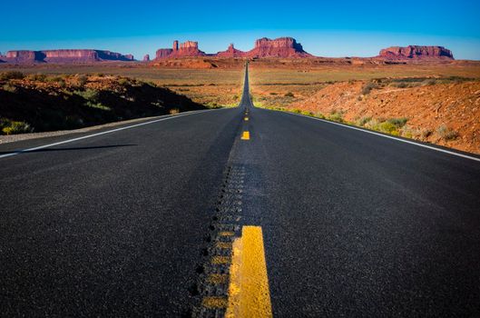 Highway Road U.S. Highway 163 and Monument Valley at sunset, Arizona, United States