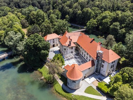 Romantic Otocec Castle on Krka River in Slovenia. Drone View