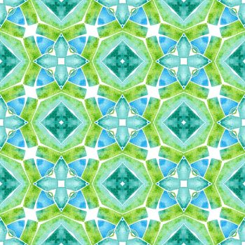 Watercolor ikat repeating tile border. Green radiant boho chic summer design. Ikat repeating swimwear design. Textile ready precious print, swimwear fabric, wallpaper, wrapping.