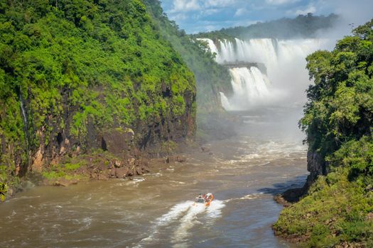 Speed boat on the Iguazu river at the Iguazu Falls, view from above, Argentine side
