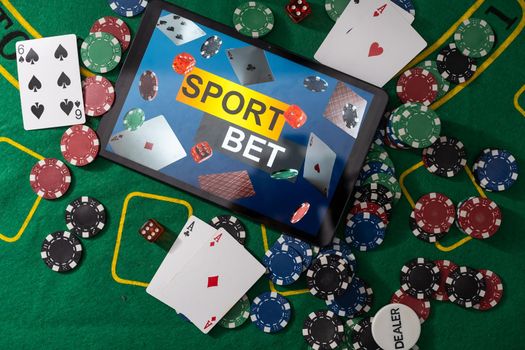 Gambling online casino Internet betting concept green screen. smartphone with poker chips, dice. Jackpot, casino chips