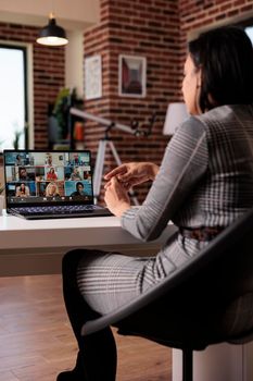 Business people attending videocall conference online on laptop with webcam, talking on remote teleconference call. Using virtual videoconference meeting on web app, telecommunications.