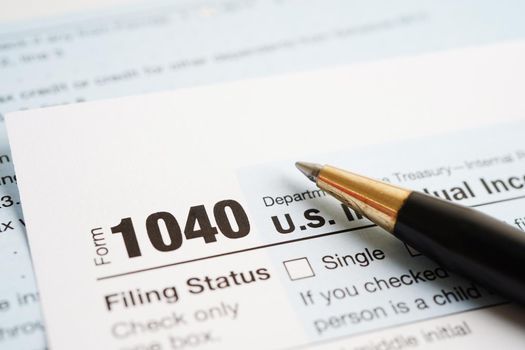Tax form 1040 U.S. Individual Income Tax Return, business finance concept.