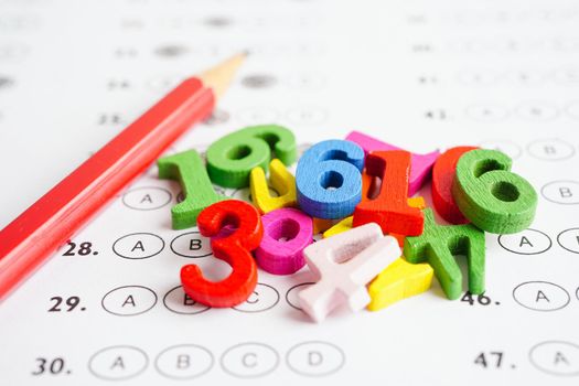 Math number with pencil on answer sheet test choice for learning Mathematic, education math concept.