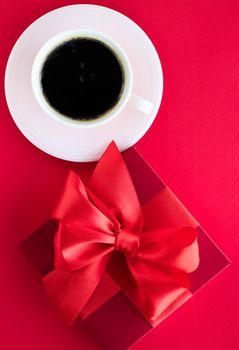 Romantic celebration, lifestyle and birthday present concept - Luxury beauty gift box and coffee on red, flatlay