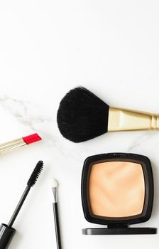 Make-up and cosmetics on marble, flatlay - modern feminine lifestyle, vlog background and styled stock concept. Beauty inspiration in a fashion blog