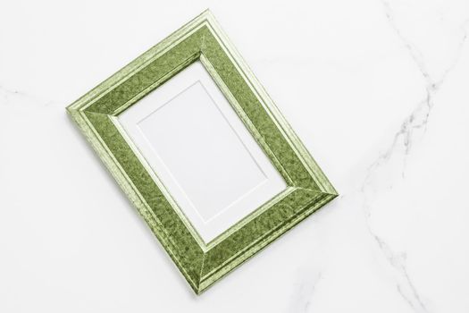 Modern feminine, artwork mock up, luxury design concept. Decorate with chic and style - Green photo frame on marble, flatlay