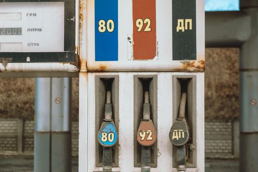 Old gasoline dispenser background pump petrol pumps station close up. Abandoned and Rusty Gas Tank download photo