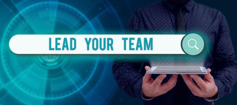 Sign displaying Lead Your Team, Internet Concept Be a good leader to obtain success and accomplish goals Man In Suit Displays With Hands Digital Signs Used For Crucial Data.