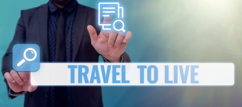 Inspiration showing sign Travel To Live, Business showcase Get knowledge and exciting adventures by going on trips Businessman in suit holding open palm symbolizing successful teamwork.