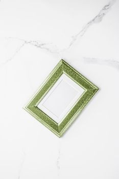 Modern feminine, artwork mock up, luxury design concept. Decorate with chic and style - Green photo frame on marble, flatlay