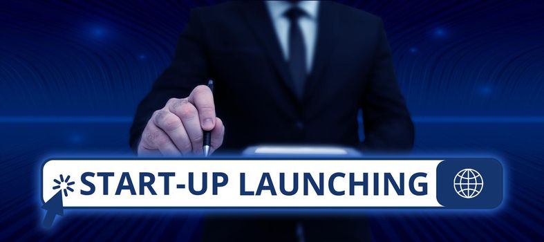 Inspiration showing sign Start Up Launching, Business idea Launch starting strategies of an newly emerged business Businessman In Suit Pointing With One Finger On Important Message.