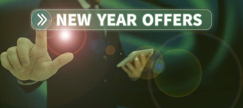 Text sign showing New Year Offers, Concept meaning Final holiday season discounts price reductions sales Businessman in suit holding notepad symbolizing successful teamwork.