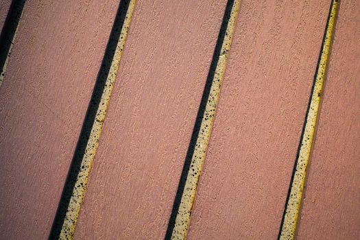 detail of a bench in a city park close-up