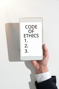 Text caption presenting Code Of Ethics, Word Written on Moral Rules Ethical Integrity Honesty Good procedure Frame Decorated With Colorful Flowers And Foliage Arranged Harmoniously.