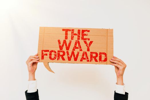 Sign displaying The Way Forward, Word for Direction to keep going with success Motion strategy Businesswoman Holding Speech Bubble With Important Messages.