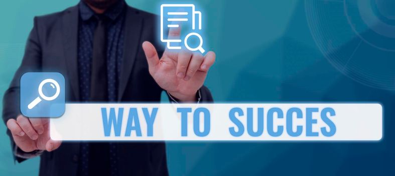 Conceptual display Way To Success, Business concept On the right path to be successful achieving goals dreams Businessman In Suit Pointing Important Informations Between Hands.