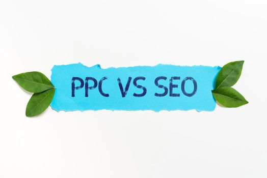 Writing displaying text Ppc Vs Seo, Conceptual photo Pay per click against Search Engine Optimization strategies Businessman Checking Circle Button Of The Blue Glowing Technology System.