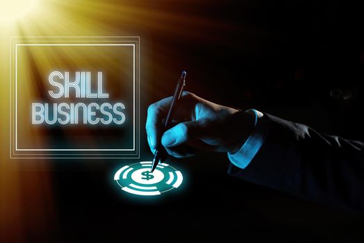 Text caption presenting Skill BusinessAbility to handle business venture Intellectual expertise, Business overview Ability to handle business venture Intellectual expertise Businessman in suit holding open palm symbolizing successful teamwork.