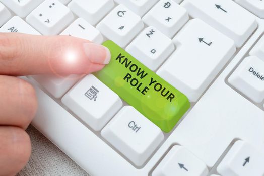 Hand writing sign Know Your Role, Word for Be clear of one responsibilities in a job or situation Woman Holding A Tablet And Pen Pressing On Security For Crucial Data.