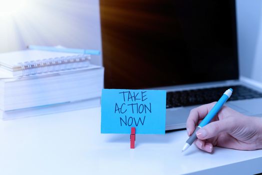 Conceptual display Take Action Now, Internet Concept asking someone to start doing Good performance Encourage Businessman in suit holding notepad symbolizing successful teamwork.