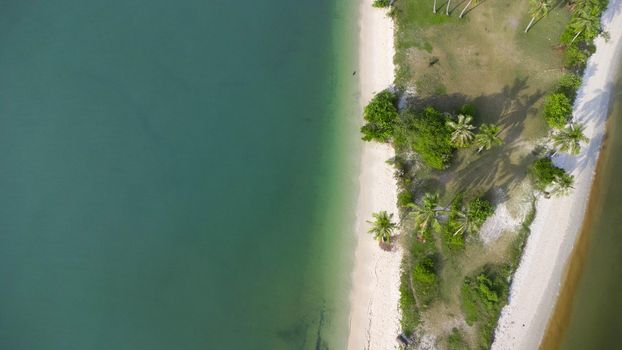 Sandy beach jutting out into the middle of the sea with beautiful water. Laem Haad Beach, Famous attractions of Koh Yao Yai, Phang Nga, Thailand.