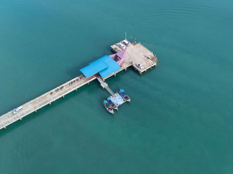 Aerial view from drone of Yacht and cruise ship parked in the marina. Transportation and travel background, beautiful sea in summer.