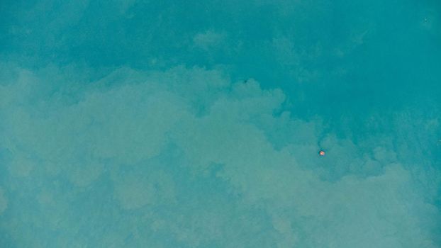 Aerial view from the drone of the sea. background image of sea surface. blue sea background in tropical sea