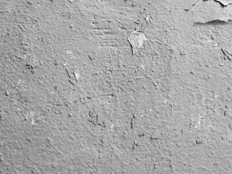 Concrete wall texture with plaster and paint Gray wall texture. Background of old damaged plaster.