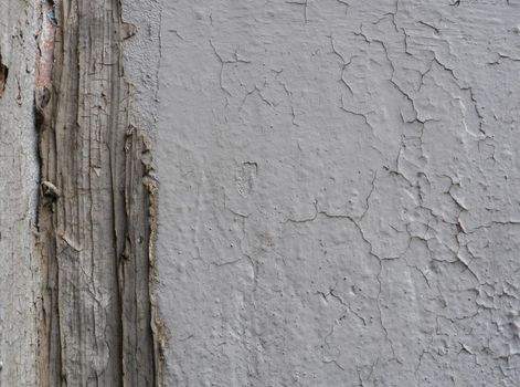 Cracked Concrete Wall Detail Background. peeling paint and plaster. Texture, material background.