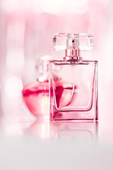 Perfume bottles on glamour background, floral feminine scent, fragrance and eau de parfum as luxury holiday gift, cosmetic and beauty brand present concept