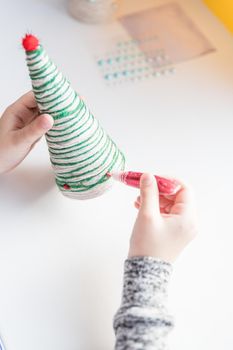 Making Christmas tree . Original children's art project. DIY concept. Step-by-step photo instructions.