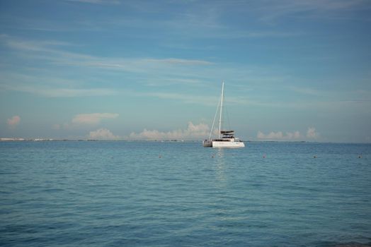 Sailboat in the sea luxury summer adventure, active vacation in Mediterranean sea. Blue water color