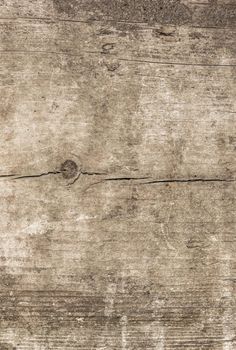 Old board with knots, cracks, dirt. Vertical background. Backdrop