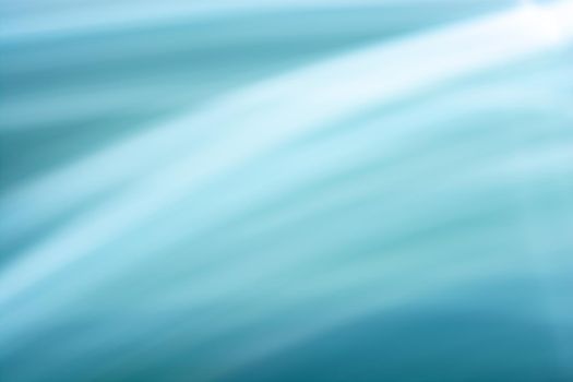 Abstract background banner with a slight blur of waves and lines in a soft blue turquoise tone. Backdrop