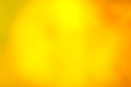 Bright yellow background with slight vinification and blurring. Smooth gradient. Heat abstraction. Backdrop