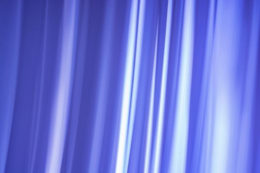 Abstraction of a curtain made of blue waves with gaps. Background banner. Backdrop