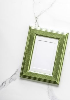 Modern feminine, artwork mock up, luxury design concept. Decorate with chic and style - Green photo frame on marble, flatlay