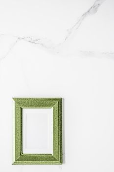 Modern feminine, artwork mock up, luxury design concept. Decorate with chic and style - Green photo frame on marble, flatlay