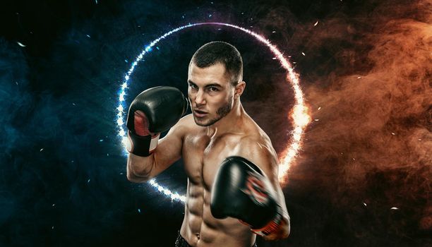 Boxer boxing in the ring. Muay thai sportsman fighting in gloves in cage. Isolated on black background with smoke and neon. Copy Space