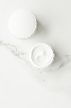 All-natural emulsion cream on marble, flatlay - skincare and body care, luxury spa and clean cosmetic concept. Time for organic beauty treatment