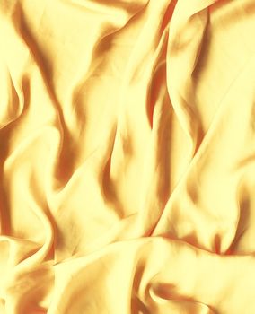 Luxury golden silk background texture - elegant fabric textures, abstract backgrounds and modern pastel colours concept