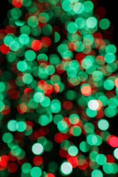 Blurred background, bokeh with colorful lights, holiday lighting.