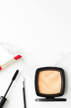 Make-up and cosmetics on marble, flatlay - modern feminine lifestyle, vlog background and styled stock concept. Beauty inspiration in a fashion blog