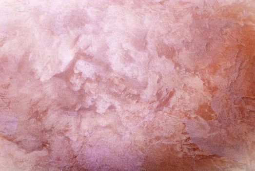 Pink colored abstract textured background.