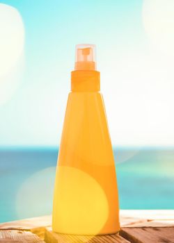 Suntan lotion outdoors - summer vacation, travel and body care concept. Protect your skin on the beach